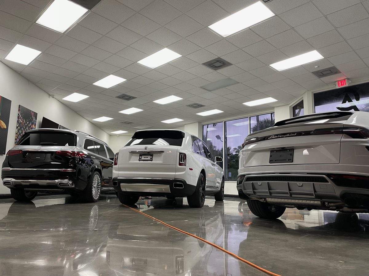 Luxury SUV fleet window tinting in South Florida including Mercedes, Rolls-Royce, and Lamborghini