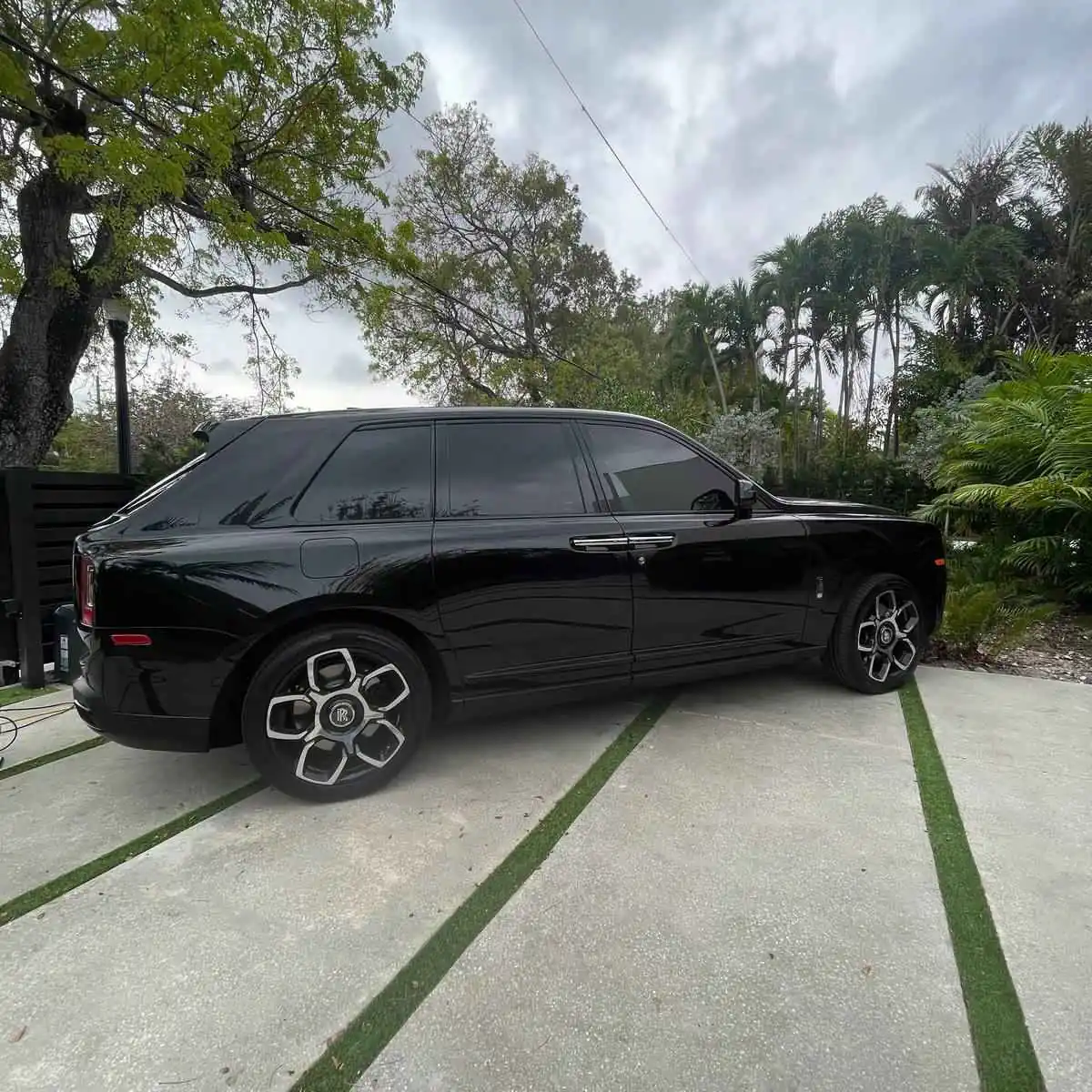 Rolls-Royce Cullinan tinted in a South Florida driveway by Shine Bright