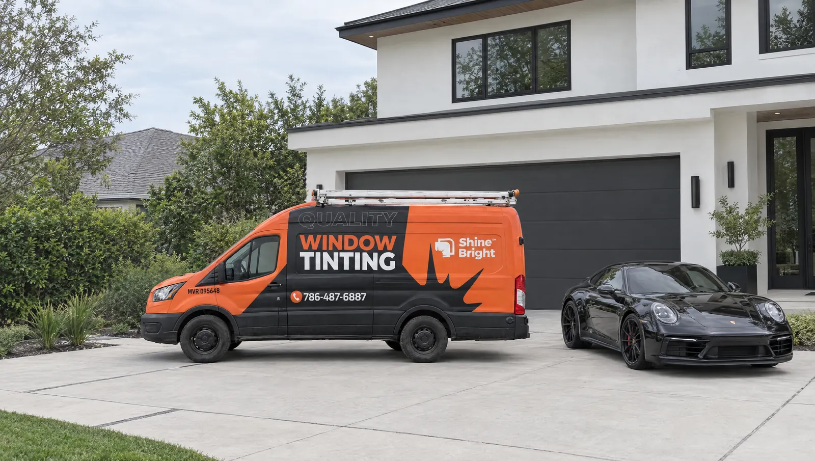 Shine Bright window tinting van parked next to a black Porsche 911 in a modern driveway
